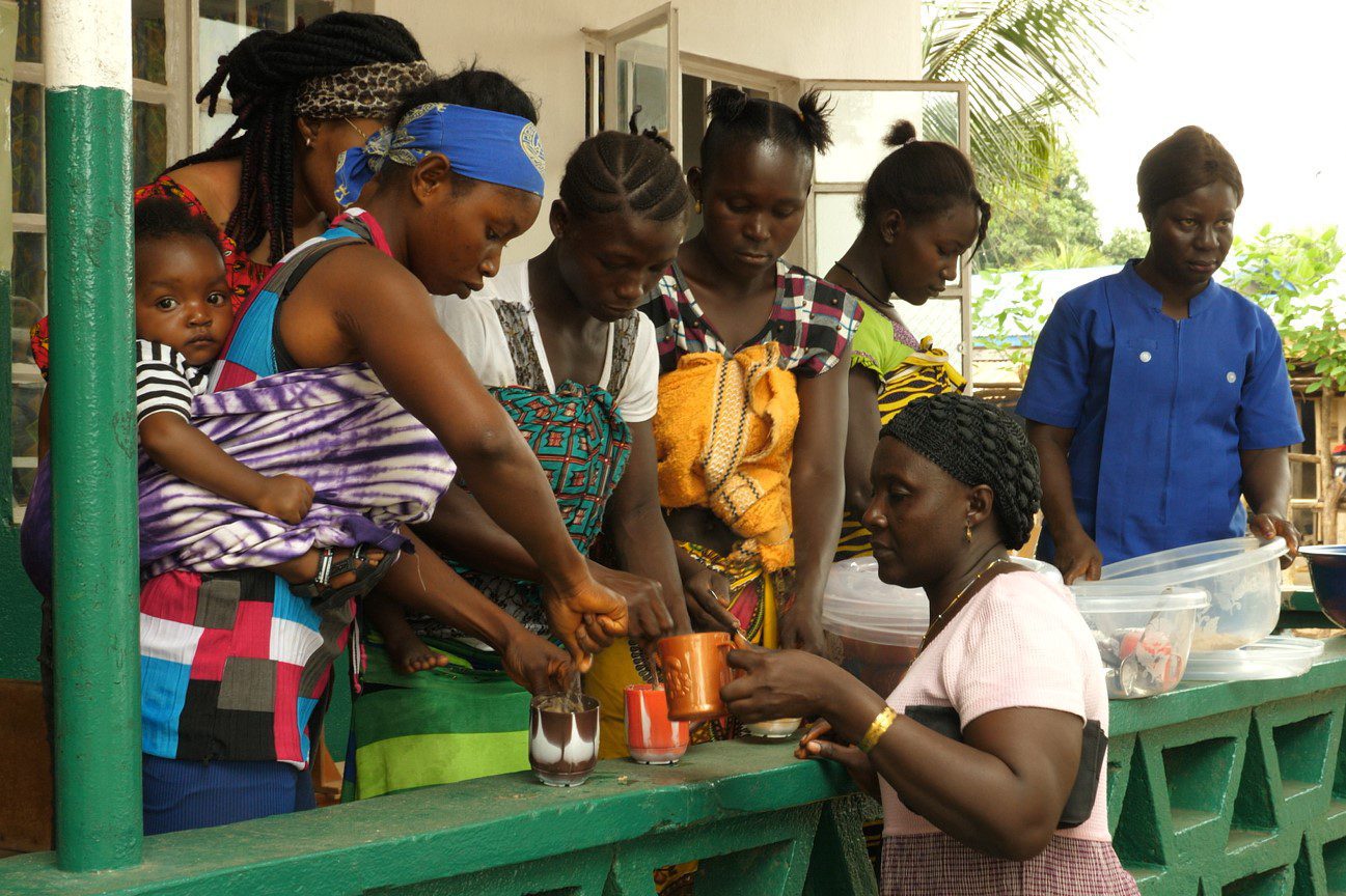 Porridge is distributed free of charge to women bringing their children to the clinic 