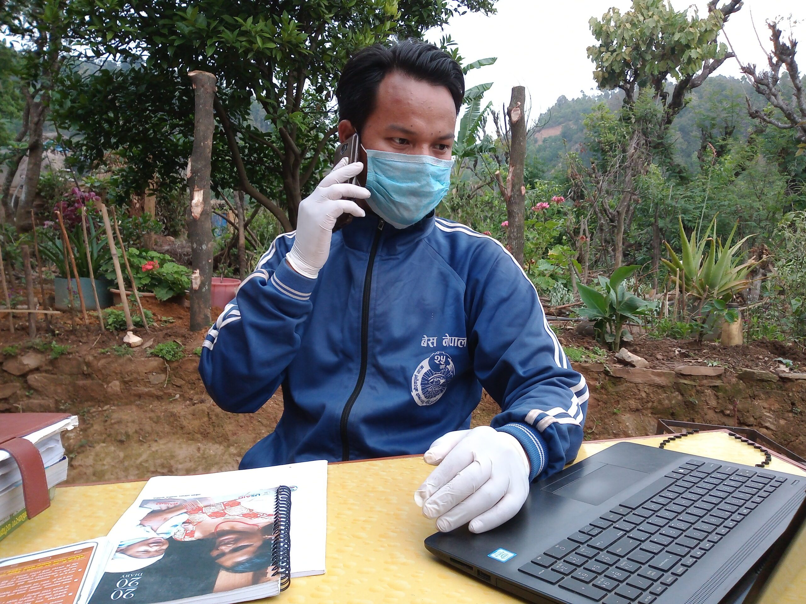Sagar Hiski, Suaahara II Field Supervisor in Nepal’s western Palpa district, counsels a breastfeeding mother about infant and young child nutrition over the phone.