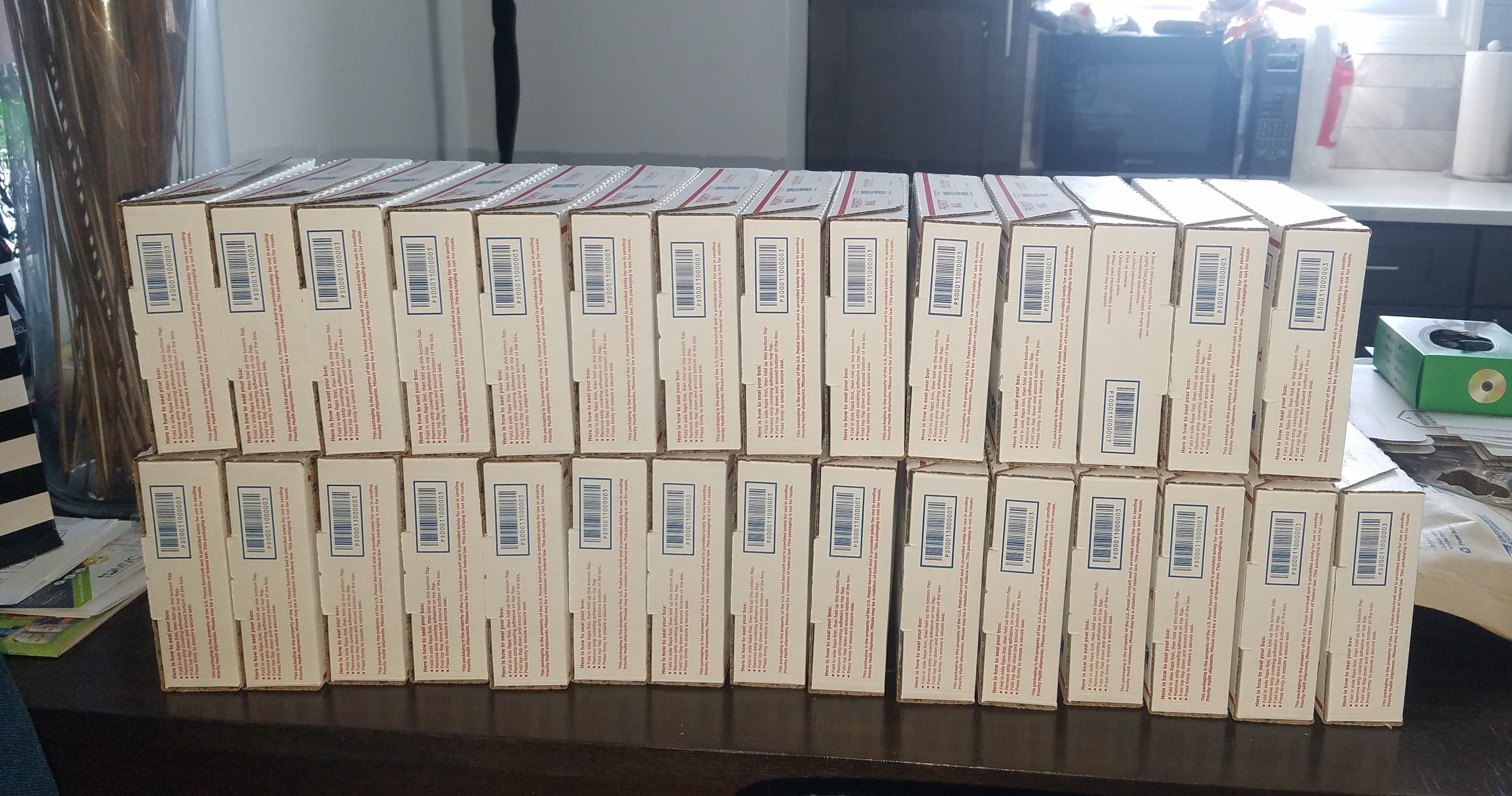 Approximately 30 boxes of individually packaged eyeglasses