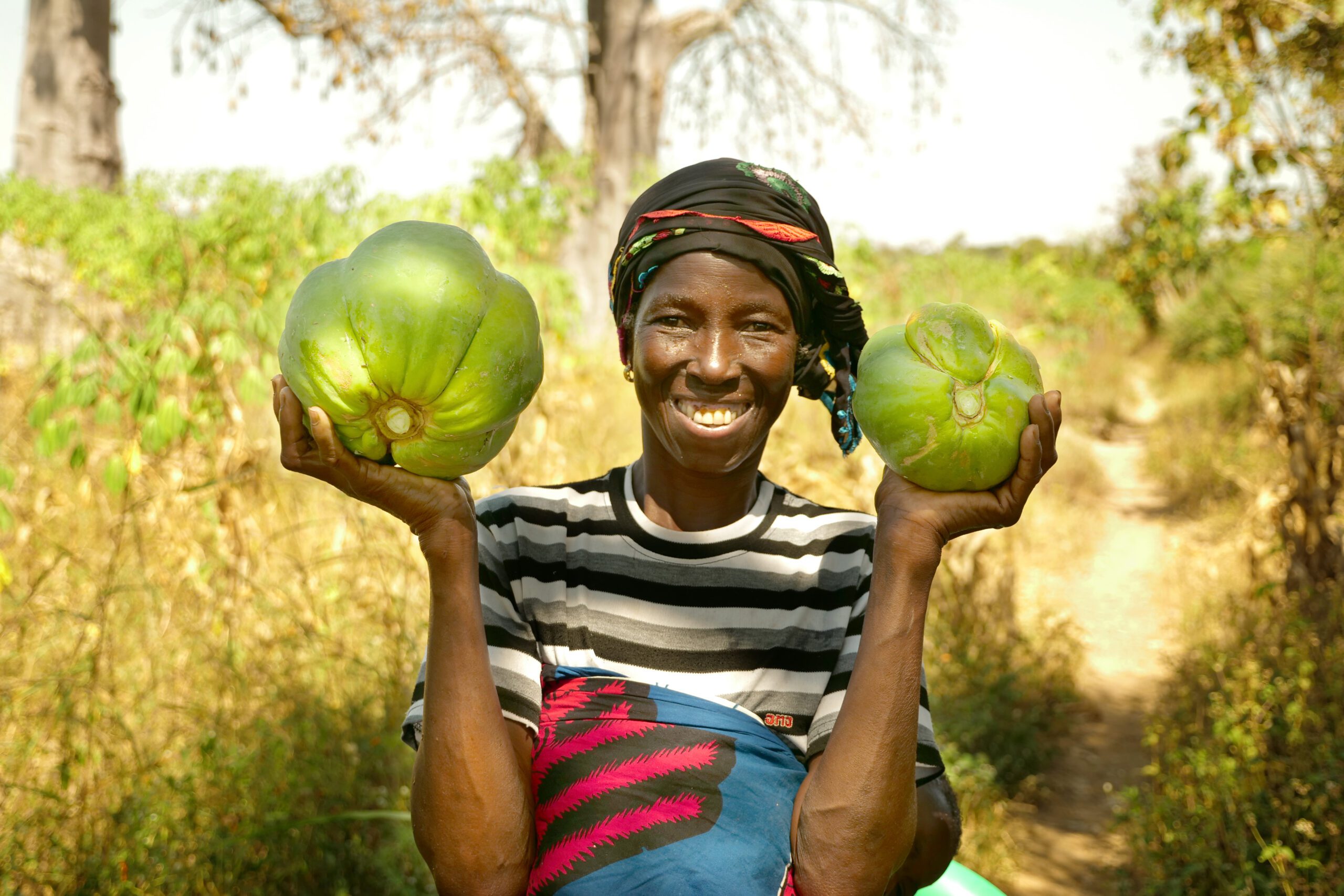 Mariam Tio holds two melons in her hands