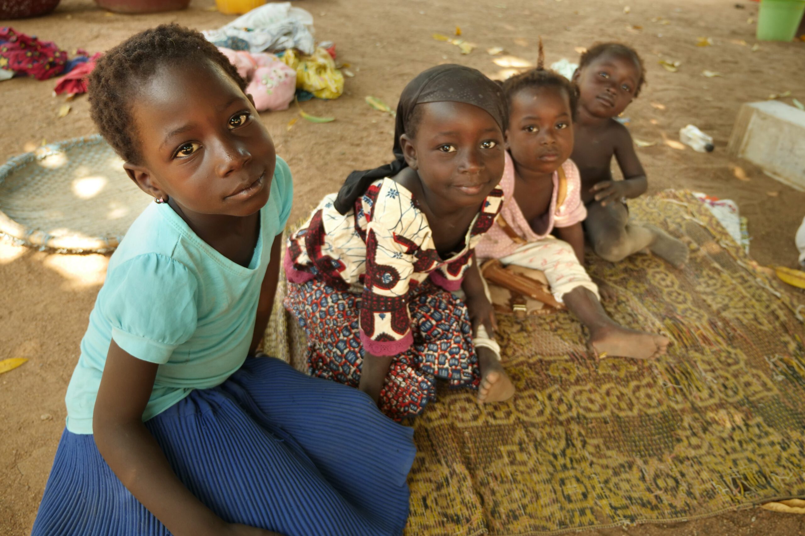 children in Cote d'Ivoire look at the camera