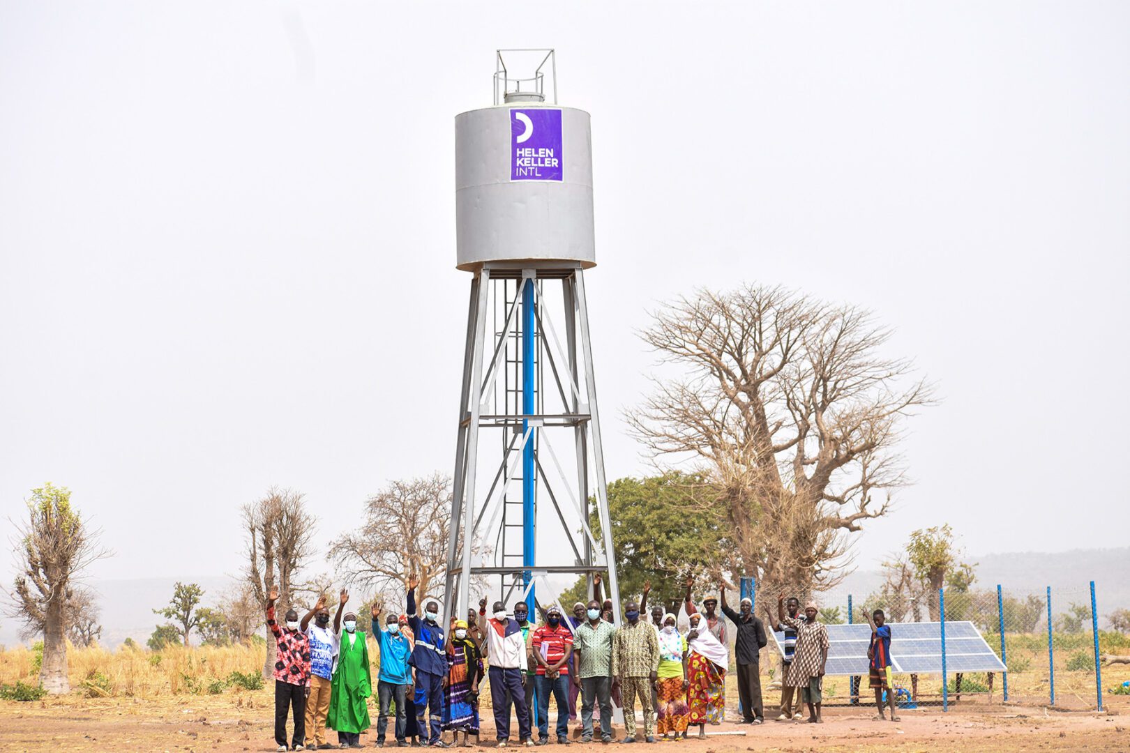Gadiala Sissoko, Village chief opens the first water jet from Kambele borehole from Helen Keller on February 24, 2022.
