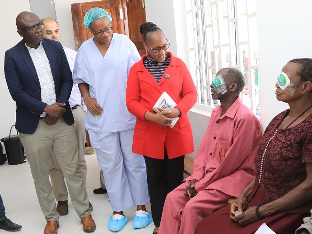 Doctors and healthcare workers check on elderly patients of successful cataracts surgeries.