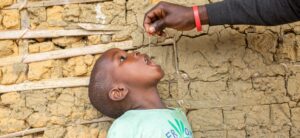A young Cameroonian boy receives a vitamin A supplement.