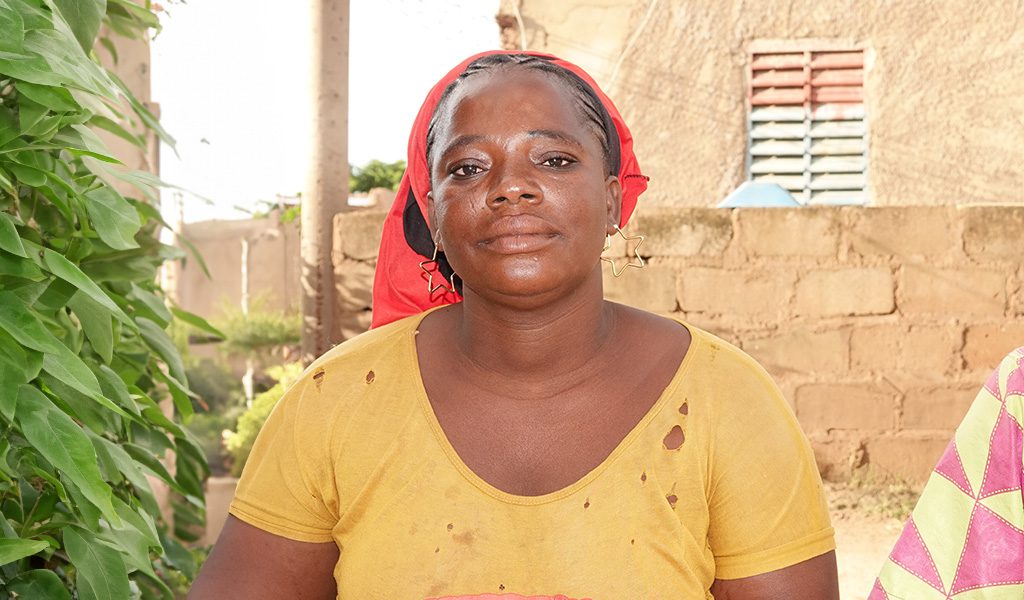 Maliatou a proud sweet potato farmer.