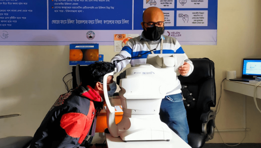 Individuals using medical equipment in a clinic