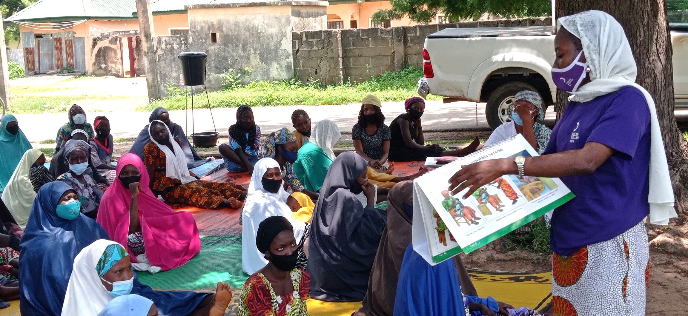 Group of women listening to health education session