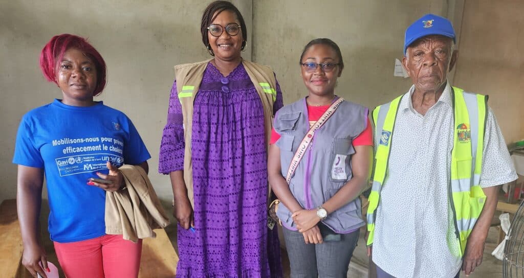86-year-old health worker Noé (right) with his colleagues during Deido's biannual Mother and Child Health and Nutrition Actions Week.