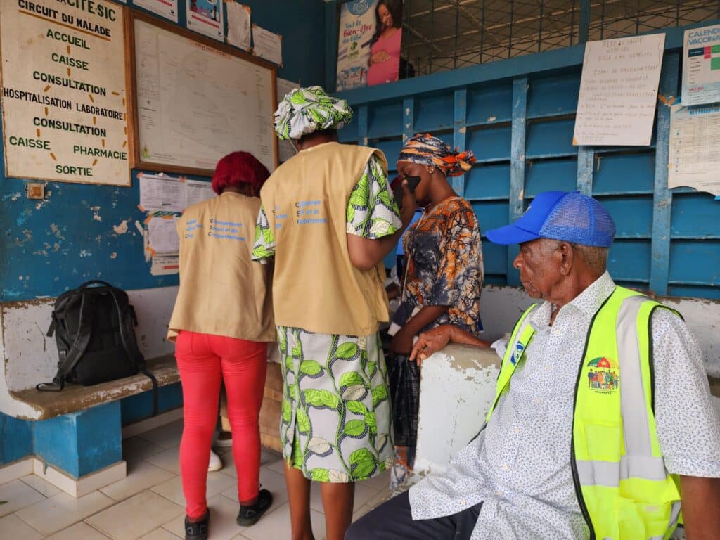 Noé (right) prepares for the biannual Mother and Child Health and Nutrition Actions Week with his colleagues in Déido, Cameroon.