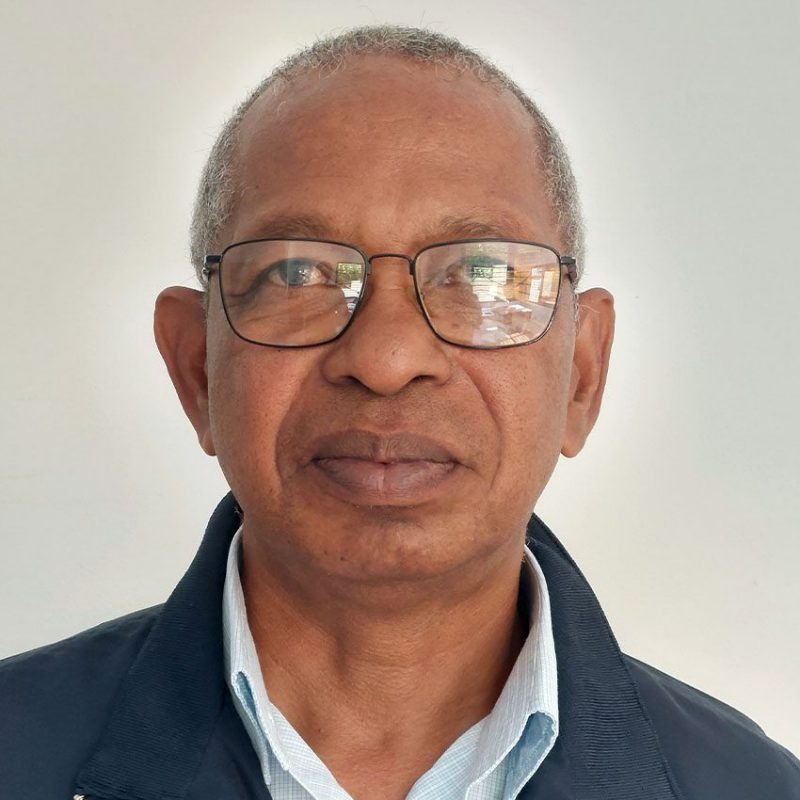 Headshot of man wearing glasses