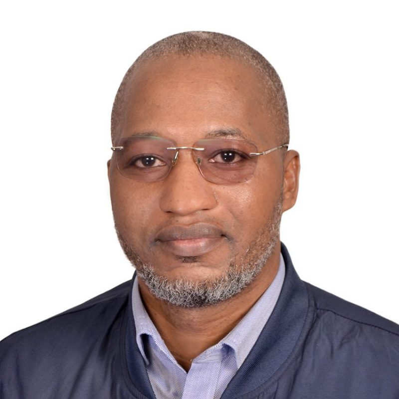 Headshot of man wearing glasses